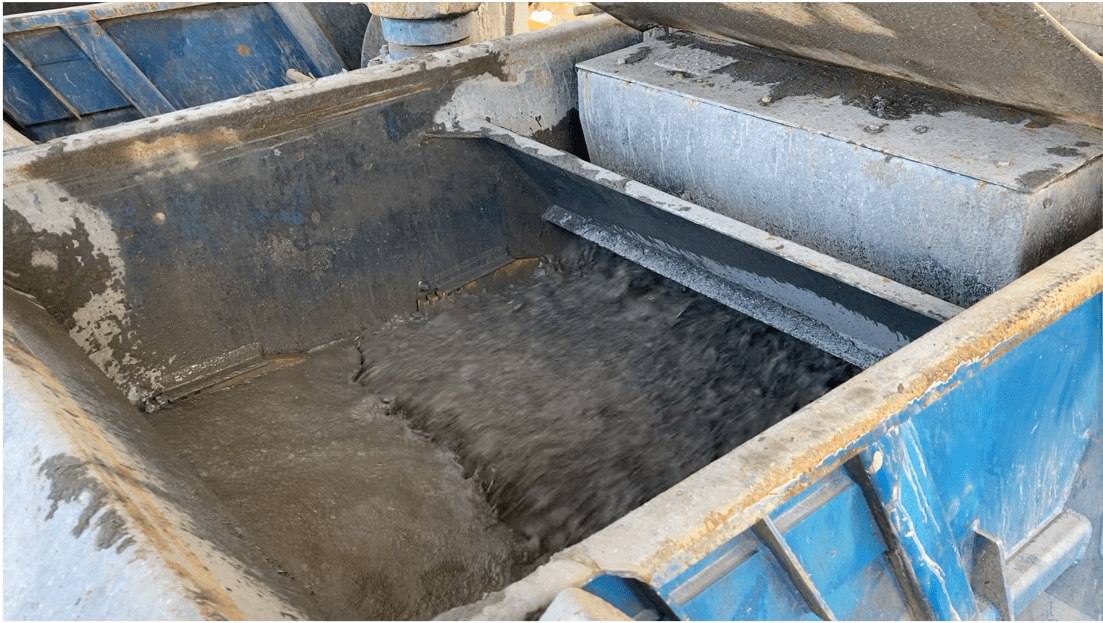 drilling mud coming from the borehole